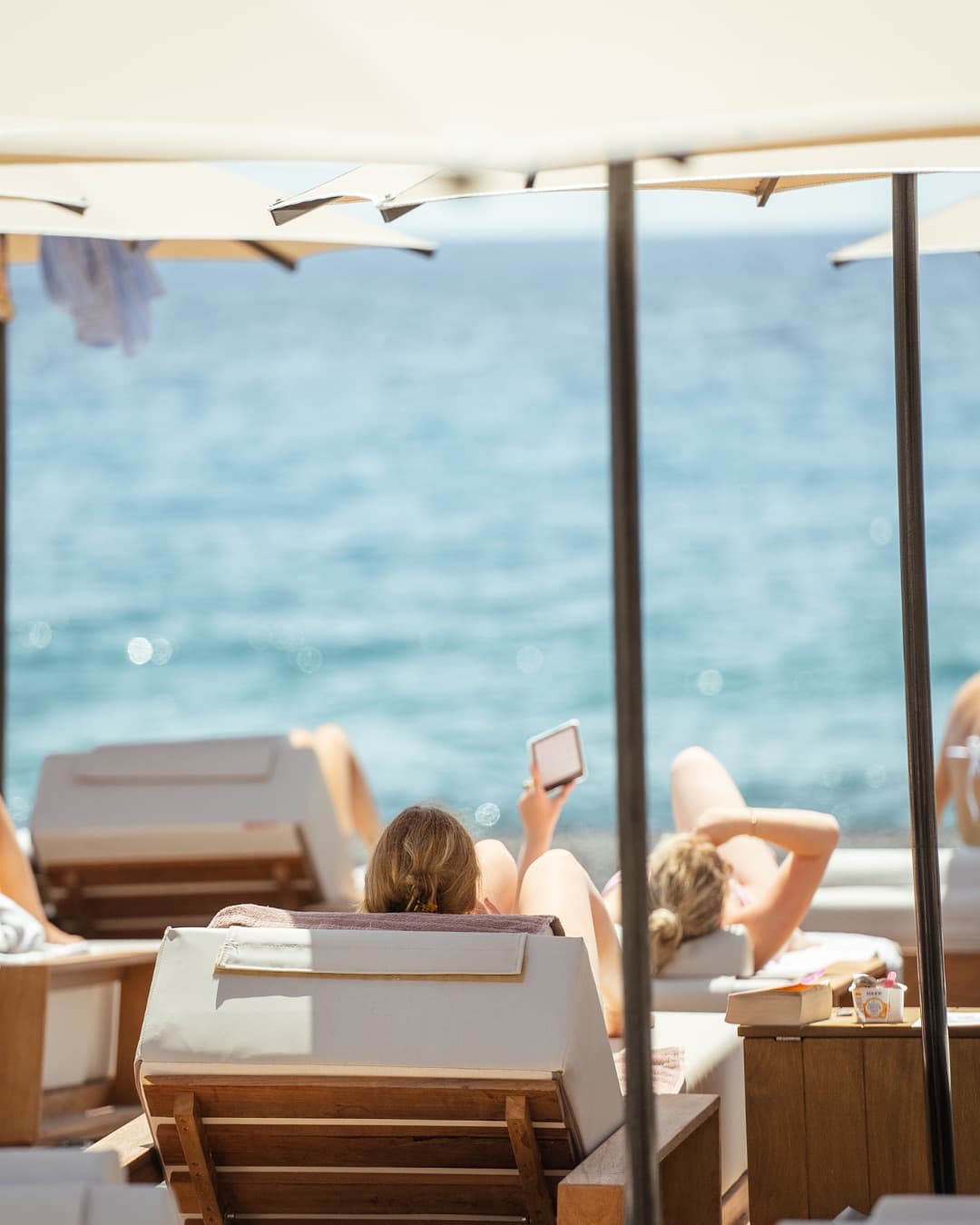 Loungers by the Shore
